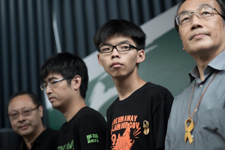 <p>Benny Tai of prominent pro-democracy group Occupy Central, and Hong Kong student leaders Alex Chow, Joshua Wong and Alan Leong, of the Civic Party attend a press conference at the pro-democracy protesters camp site in the Admiralty district of Hong Kong on Oct. 26, 2014</p>