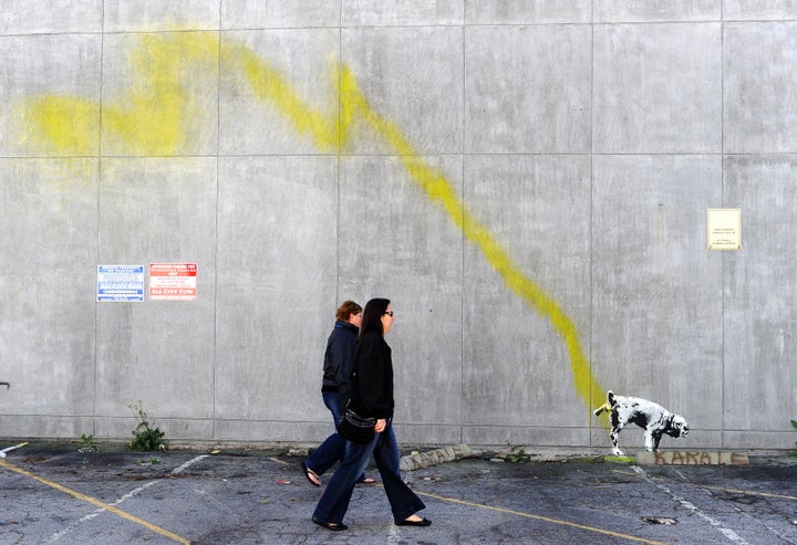 Image of urinating dog accredited to Banksy.