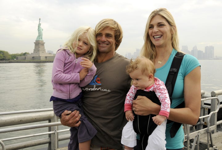 <p>Hamilton, Gabrielle Reece and their two daughters in 2008.</p>