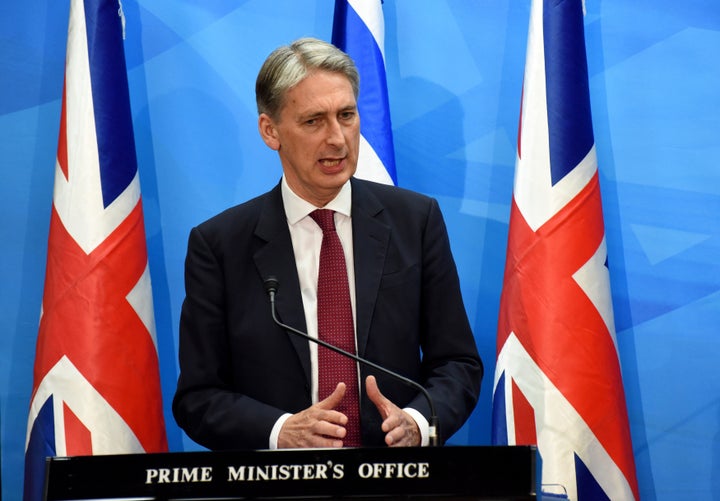 British Foreign Secretary Philip Hammond speaks in favor of the Iran nuclear deal at a press conference at the Israeli prime