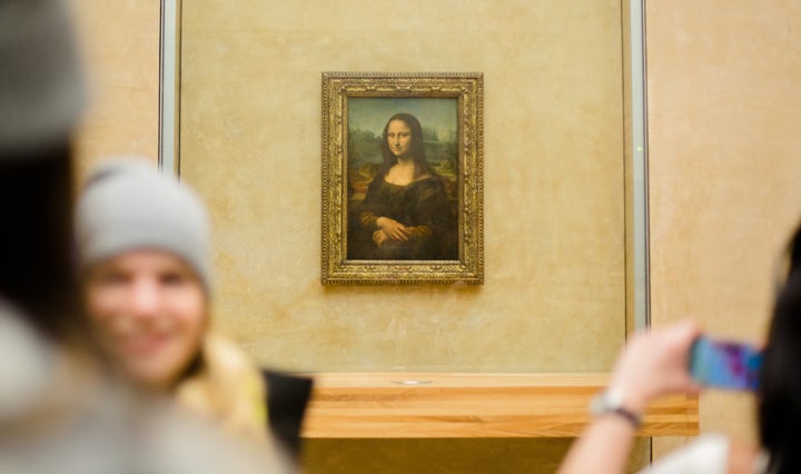 A controversial younger Mona Lisa painting goes on display in