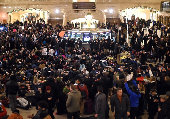 <p>Protesters lie down in Manhattan's Grand Central Terminal during a demonstration on Dec. 3, 2014.</p>