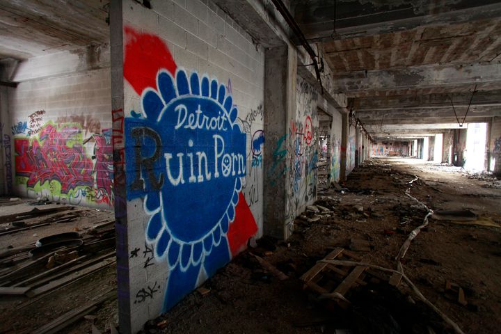 Graffiti on the walls of the Packard Plant in Detroit, December 13, 2013. (Photo by Joshua Lott/Getty Images)