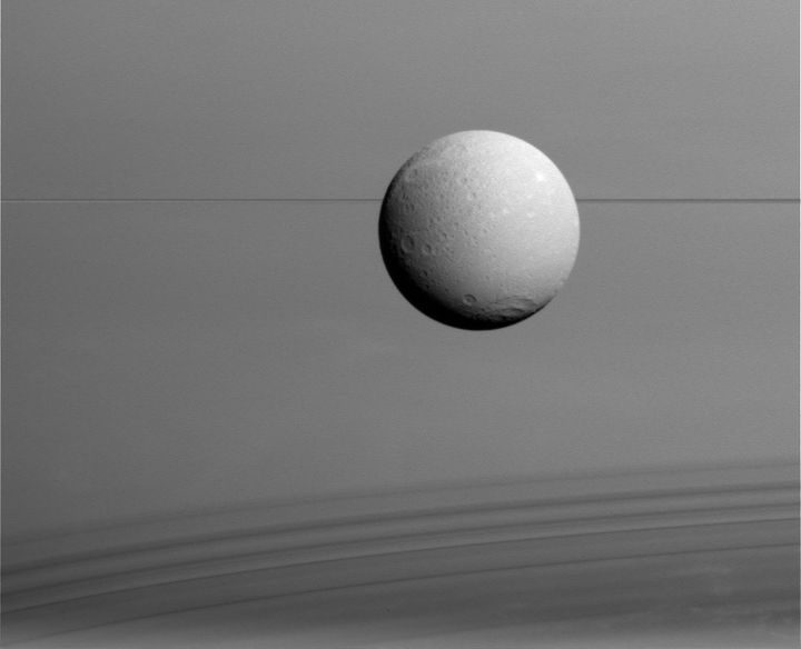 Dione, one of the moons of Saturn. 
