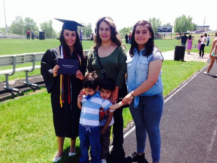 <p>Andazola Marquez with her mother, sister and two brothers at her high school graduation in 2014.</p>