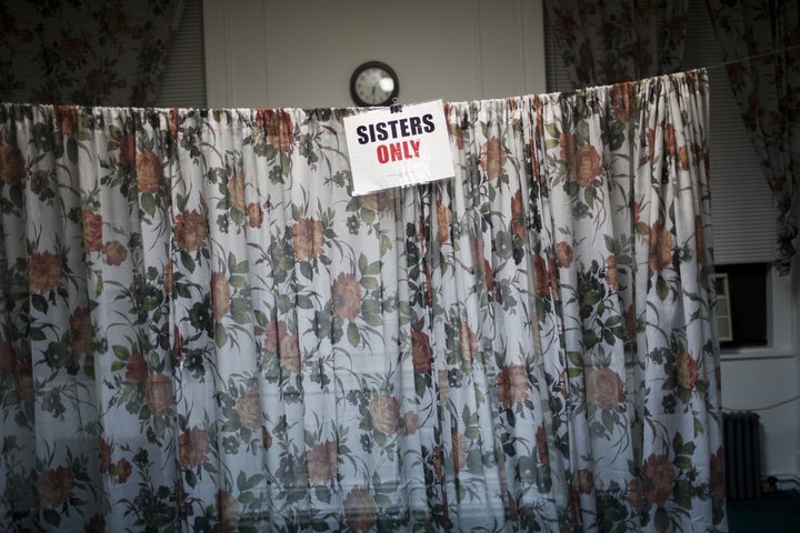 A screen at a New York City mosque marks off an area designated for women to pray December 9, 2011.