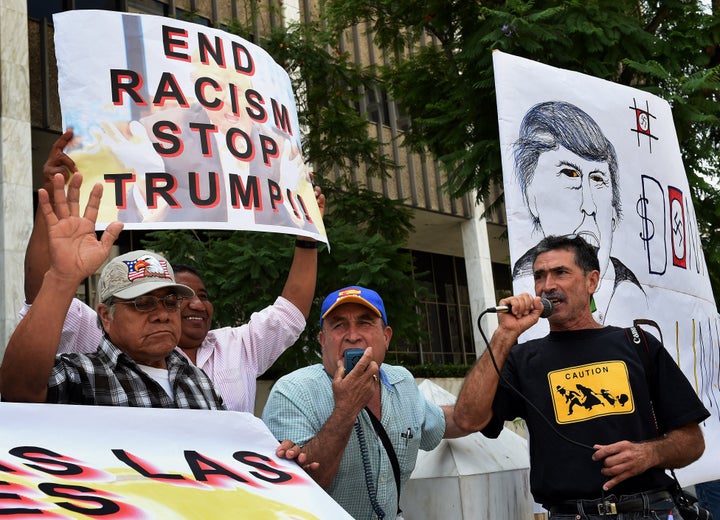 Latino community activists protest Trump's candidacy in Los Angeles on August 19.