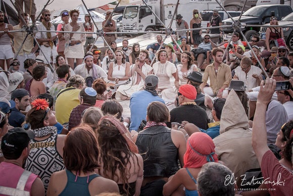 <p>Milk & Honey's Shabbat service at Burning Man in 2014.</p>