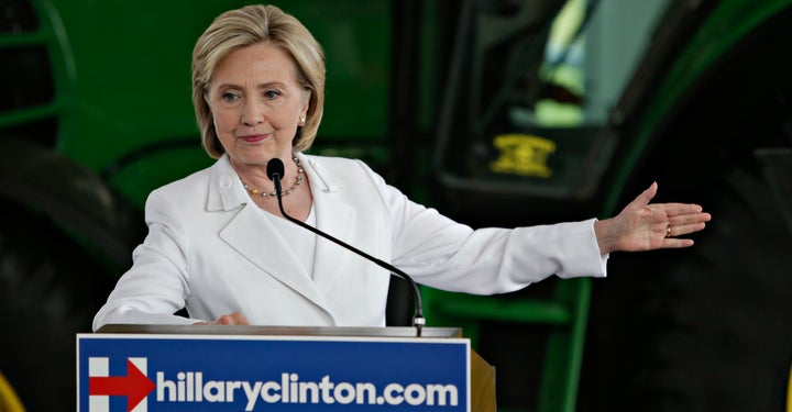 Two of Hillary Clinton's former aides received large bonuses from their former Wall Street employers prior to joining the Sta