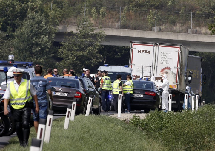 Police work around a refrigerated truck near Parndorf, Austria, on Aug. 27, 2015.