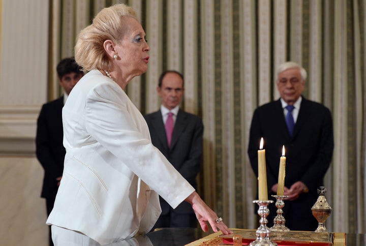 Vassiliki Thanou swears in as Greke prime minister at a brief ceremony at the presidential mansion in Athens, Greece, on Aug. 27, 2015.