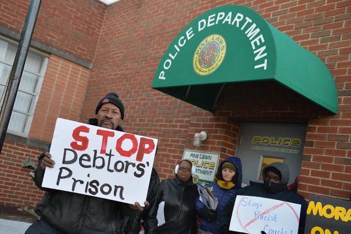 Protesters gather outside the Pine Lawn Police Department in Missouri.