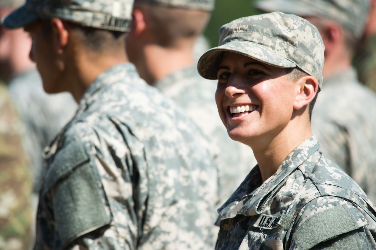Capt. Kristen Griest smiles at friends and family as she waits with her U.S. Army Ranger School Class 08-15 to graduate at Fort Benning, Georgia, Aug. 21, 2015. Griest and class member 1st Lt. Shaye Haver became the first female graduates of the school.
