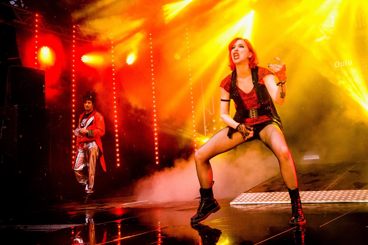 <p><span style="color: #141823; font-family: helvetica, arial, sans-serif; font-size: 13px; line-height: 18px; background-color: #ffffff;">Aline "The Devil's Niece" Westphal performs during the 2015 Air Guitar World Championships.</span></p>