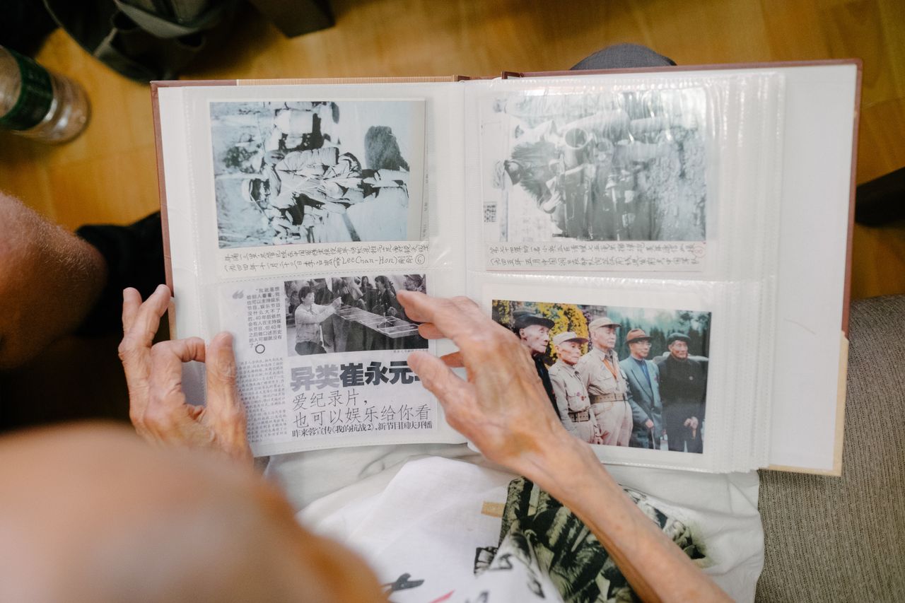 Su Ziliang maintains a scrapbook of war-related news clippings at his home in Chengdu. 