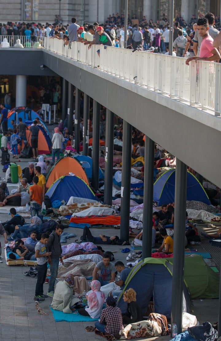 People waiting to enter the EU have filled the entire area surrounding the train terminal.