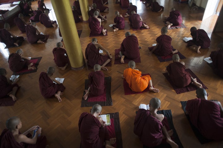<p>In this picture taken on June 23, 2015, Buddhist monks study at a monastery affiliated with the Ma Ba Tha organization (Committee to Protect Race and Religion) on the outskirts of Yangon.</p>