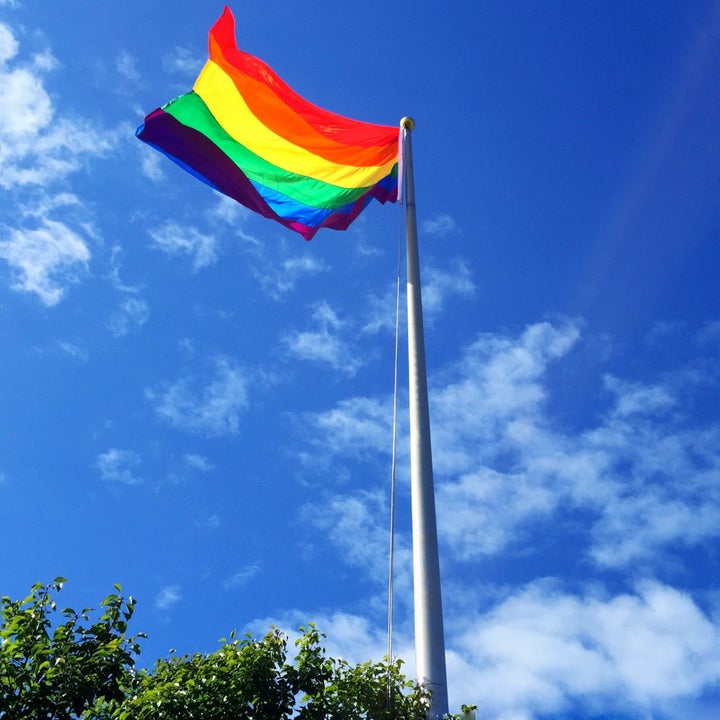 A rainbow flag was raised at the fair's front gate. 