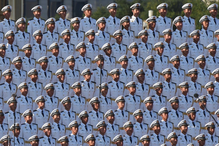 A Chinese military choir stands in position ahead of the parade.