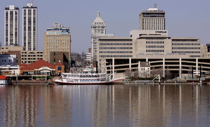 This Mar. 6, 2009, file photo shows the Peoria, Ill., skyline along the Illinois River. 