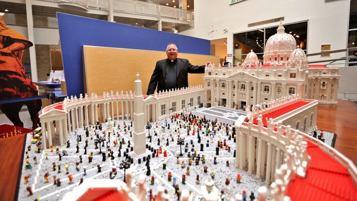 Rev. Bob Simon stands with his Lego Vatican at The Franklin Institute. 