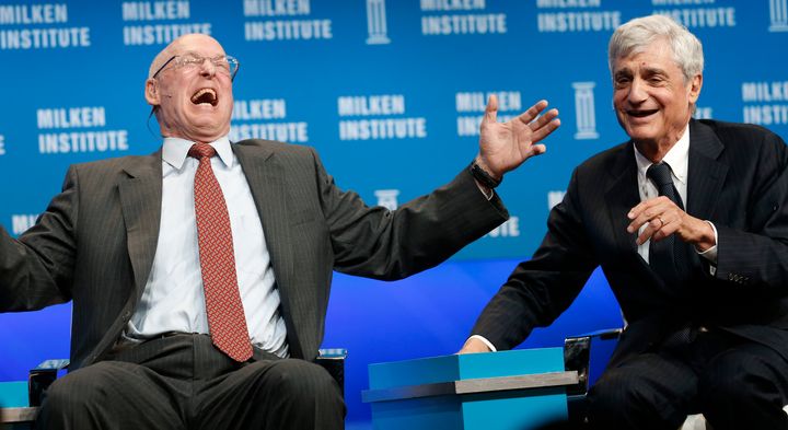 Former Treasury Secretaries Henry Paulson (left) and Robert Rubin have a good laugh about income inequality.