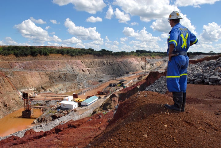 <p>A mine supervisor overlooks Metorox's Chibuluma copper mine, near Kitwe, Zambia, on Feb. 7, 2008. </p>