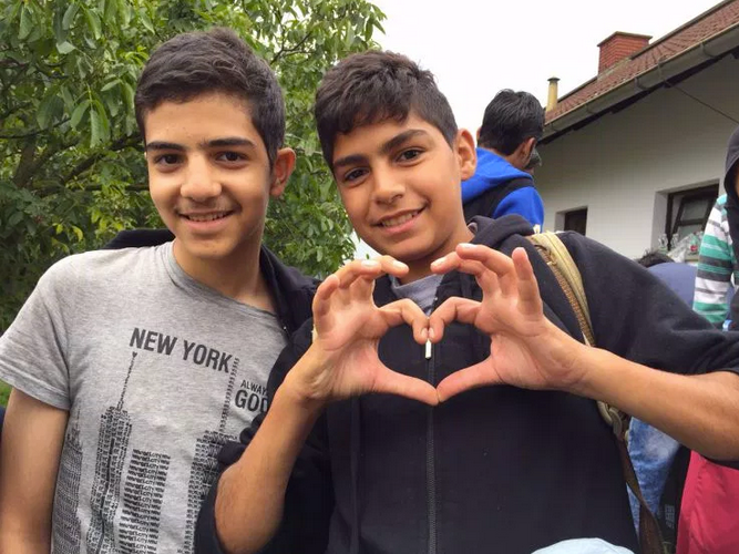 Omar's cousins Abdul Rahman (L), 15, wants to be a doctor in Germany. His younger cousin Abduljalil is just happy that he's going to live closer to his favorite football club, Bayern München. 