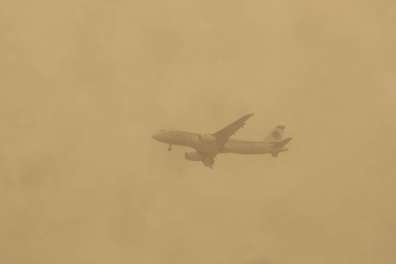 A plane is seen during a sand storm that hit Lebanon's Beirut on Sept. 8, 2015. 