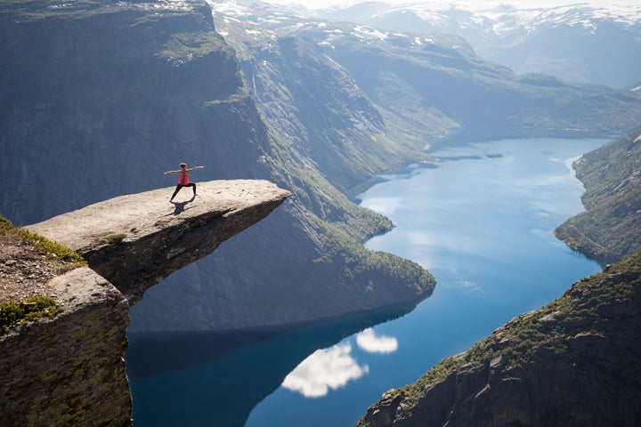 <p>A visitor poses for a photo at Trolltunga, the scenic cliff in Norway where Kristi Kafcaloudis, 24, died on Saturday.</p>