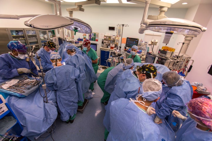 Twin girls were on two separate tables immediately after their separation surgery, but the surgery was still hours from being completed.