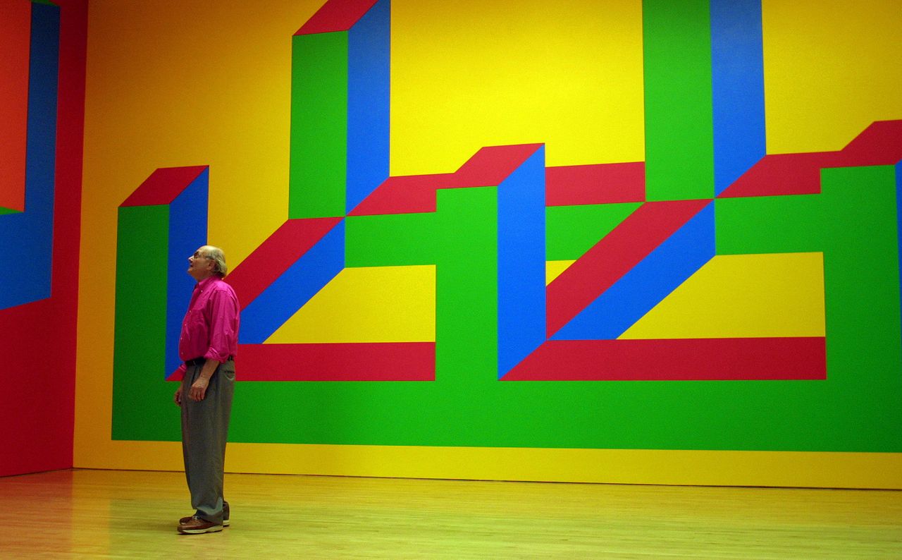 Sol Lewitt is dwarfed by his wall drawing at the Margo Leavin Gallery in Los Angeles. (Photo by Gina Ferazzi/Los Angeles Times via Getty Images)