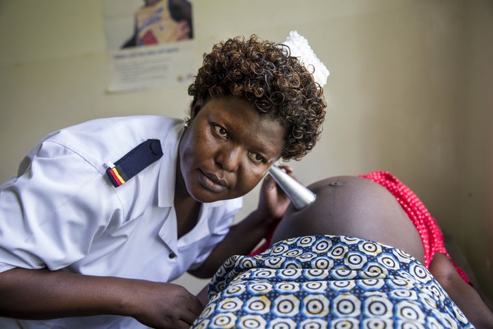 <span>Head antenatal nurse Margie Harriet Egessa providing antenatal counseling and checkups for a group of pregnant women at