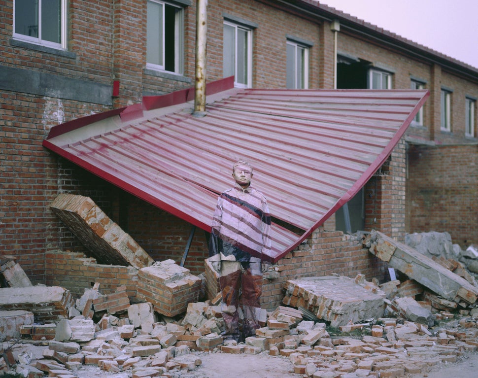 Liu blends into the background in one of his&nbsp;early pieces from Suo Jia Village.