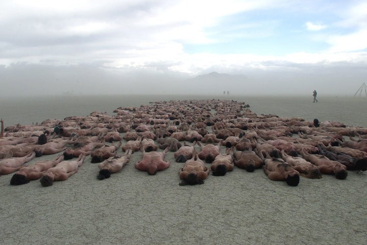 <p>People laying on the ground and trying to figure out why they came to Burning Man, probably.</p>