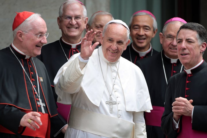 Pope Francis (C), flanked by Cardinal Marc Ouellet, Rector of the Pontifical North American College James F. Checchio, Archbishop of Los Angeles Jose Gomez and President of the United States Conference of Catholic Bishops Joseph Edward Kurtz, leaves the Pontifical North American College in Vatican City. 