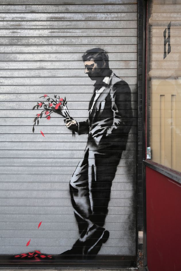 Banksy Painting Self Destructs Immediately After Being Sold For 1 4 Million Huffpost