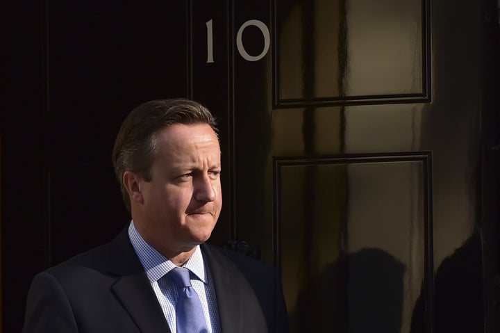 Britain's Prime Minister David Cameron outside 10 Downing Street ahead of a meeting in London on September 10, 2015.