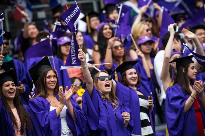 New York University students at their graduation ceremony in May 2014. The school's low-income students take on more federal loan debt than students from comparable backgrounds at the for-profit University of Phoenix.