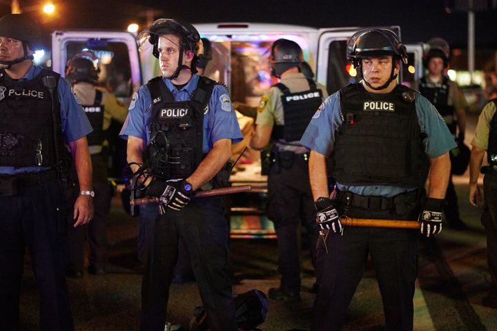 Police deployed during a civil disobedience action on August 10, 2015 on West Florissant Avenue in Ferguson, Missouri. The night ended with over 10 arrests for disorderly conduct. 
