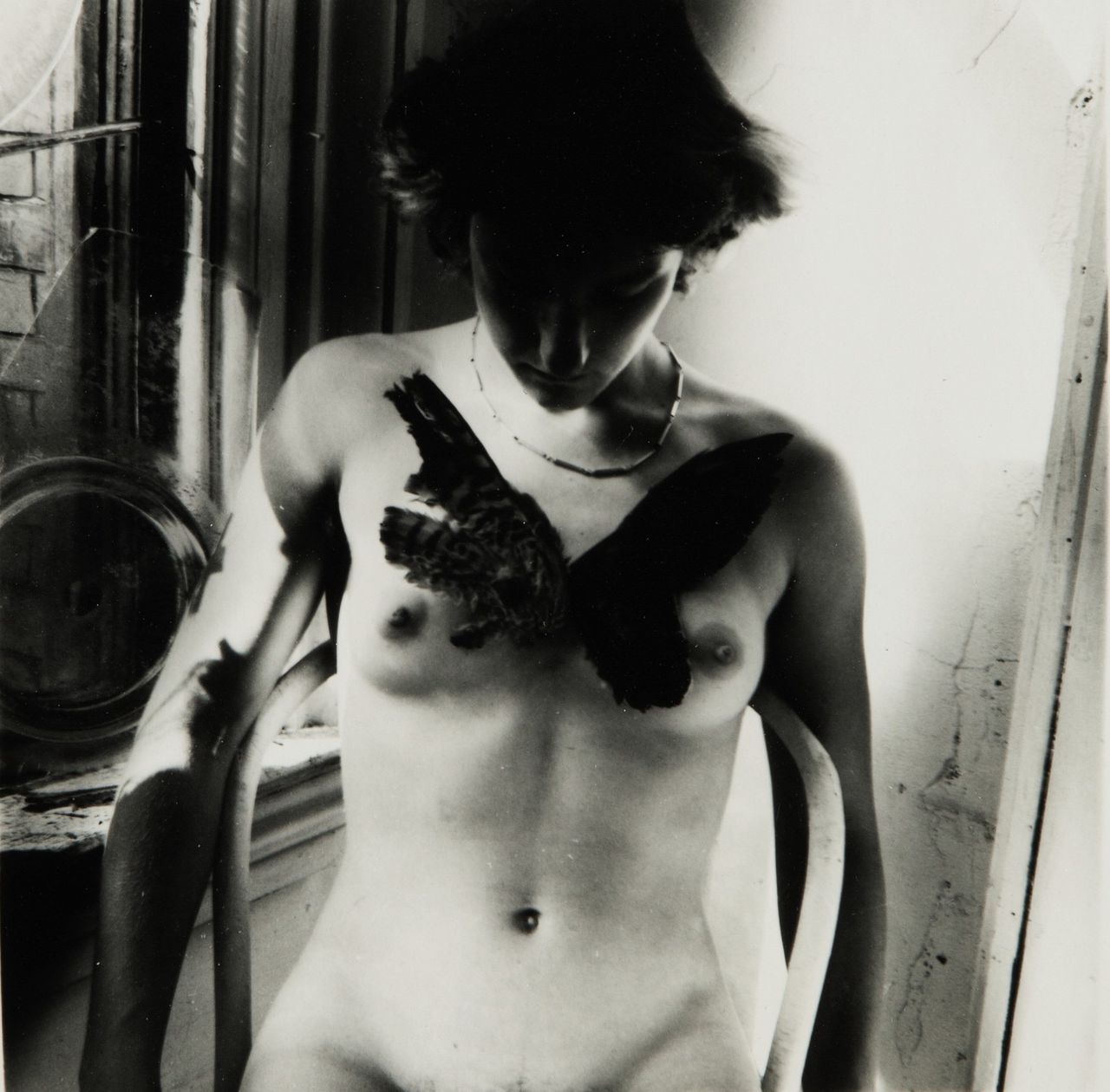 Francesca Woodman, Untitled, Providence Rhode Island (Liza with Bird), 1970s (Est. $20/30,000)