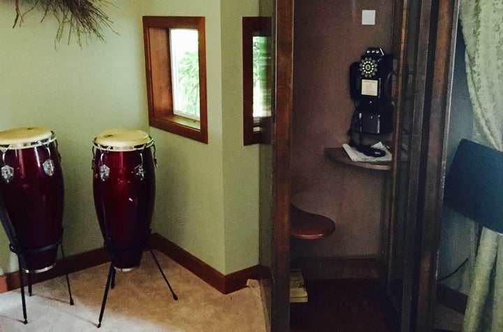 An old-fashioned telephone booth replaces cell phones at reSTART, where clients can also try their hand at various musical instruments.