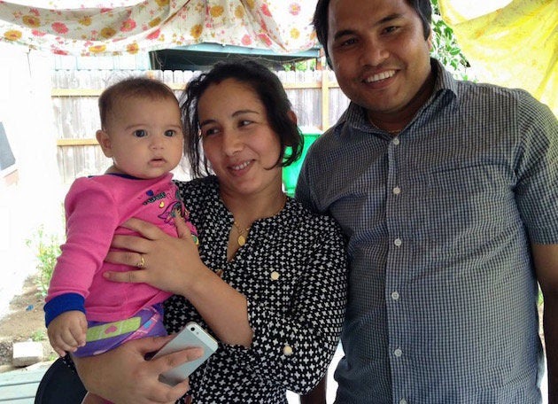 Som Nath Subedi with his wife and daughter.