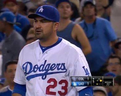 Dodgers first baseman Adrian Gonzalez was none too pleased as a spectator interfered with a routine out on Monday night.
