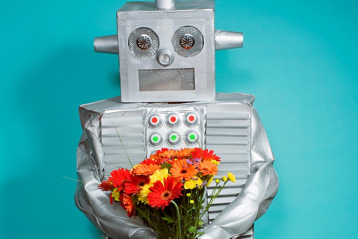 You know it's a real date when the robot brings flowers.