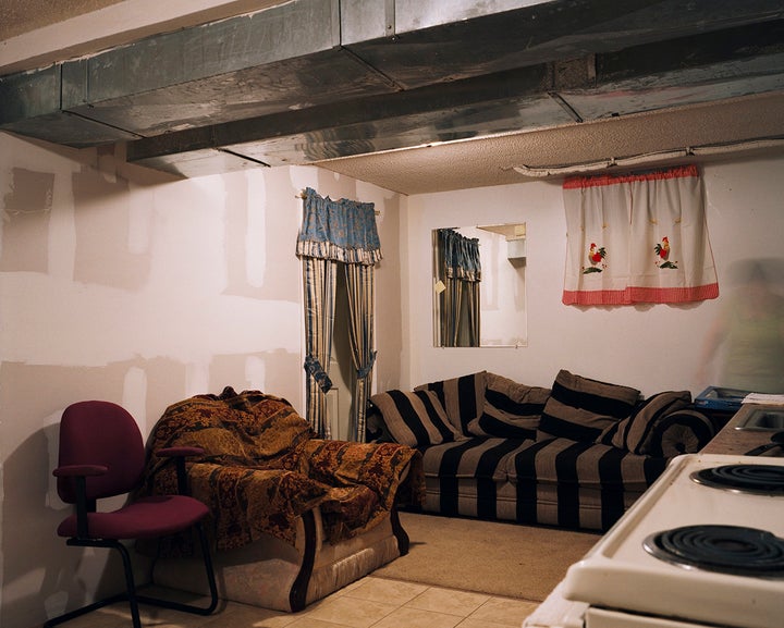 "The woman, a widow, left Guatemala after her son was killed by violence there, 8 years ago. She rents a basement apartment i