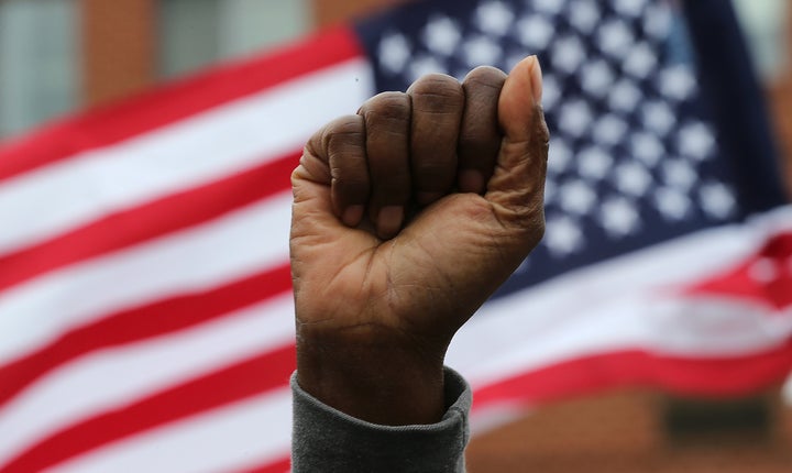 Baltimore residents stand up for Freddie Gray on May 1.