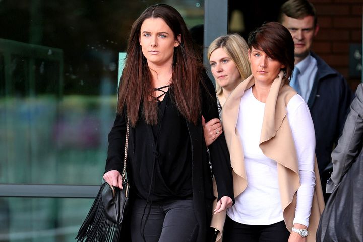 Gaby Scanlon, left, who had to have her stomach removed after drinking a cocktail mixed with liquid nitrogen, leaves Preston Crown Court in Lancashire.