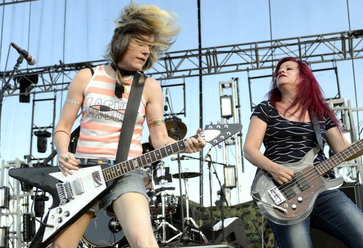 Donita Sparks (L) and Jennifer Finch of L7 perform during Riot Fest 2015 at the National Western Complex on August 30, 2015 i