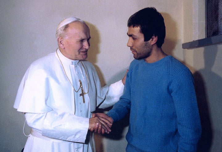 Pope John Paul II shakes hands with his would-be assassin, Mehmet Ali Agca on December 27, 1983. Ali Agca shot and wounded the pope on May 13, 1981 in St. Peter's Square in Rome.